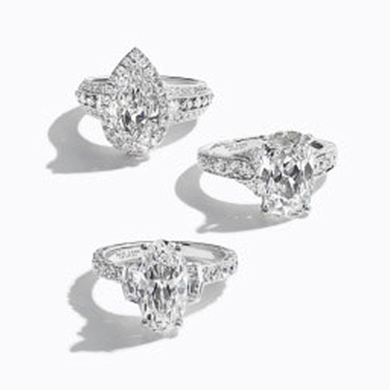 Three silver banded, lab-grown, diamond rings by Neil Lane Artistry.